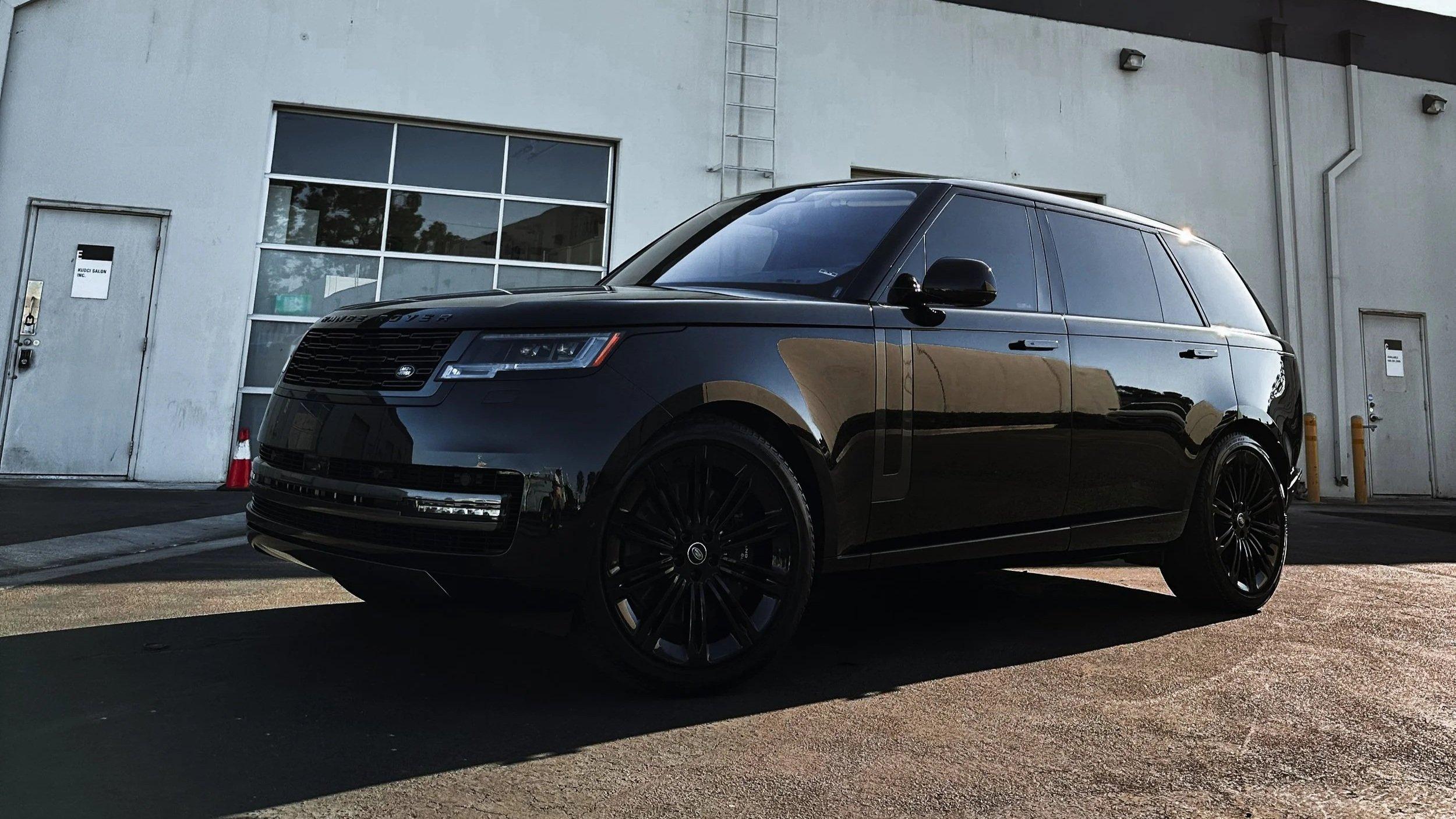 Black Range Rover with dark ceramic window tint parked outside the Irvine studio